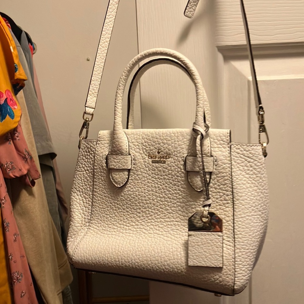 Beautiful small white Kate Spade Crossbody bag.